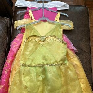 Three pack of little girls Disney dresses size 7/8.